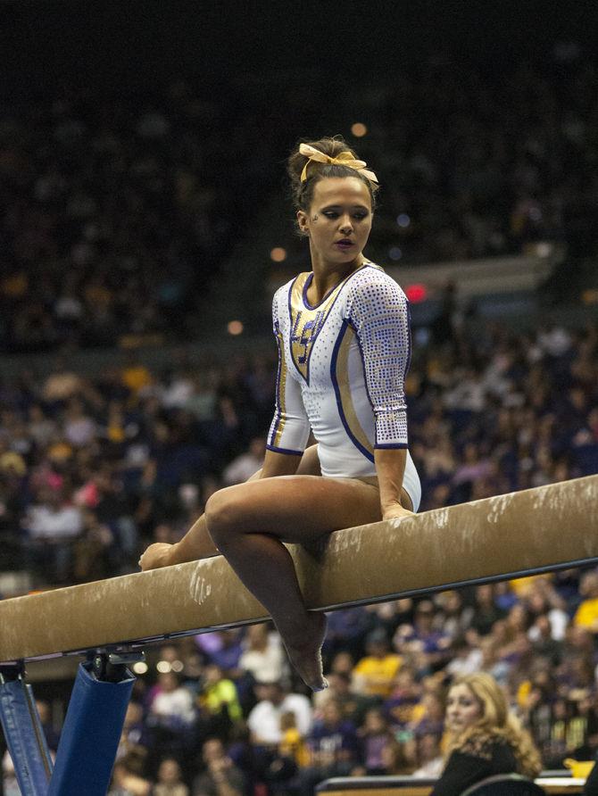 LSU all-around junior Ashleigh Gnat performs on the beam Friday, March 4, 2016, during the Tigers' 197.925-196.225 victory against Alabama in the PMAC.