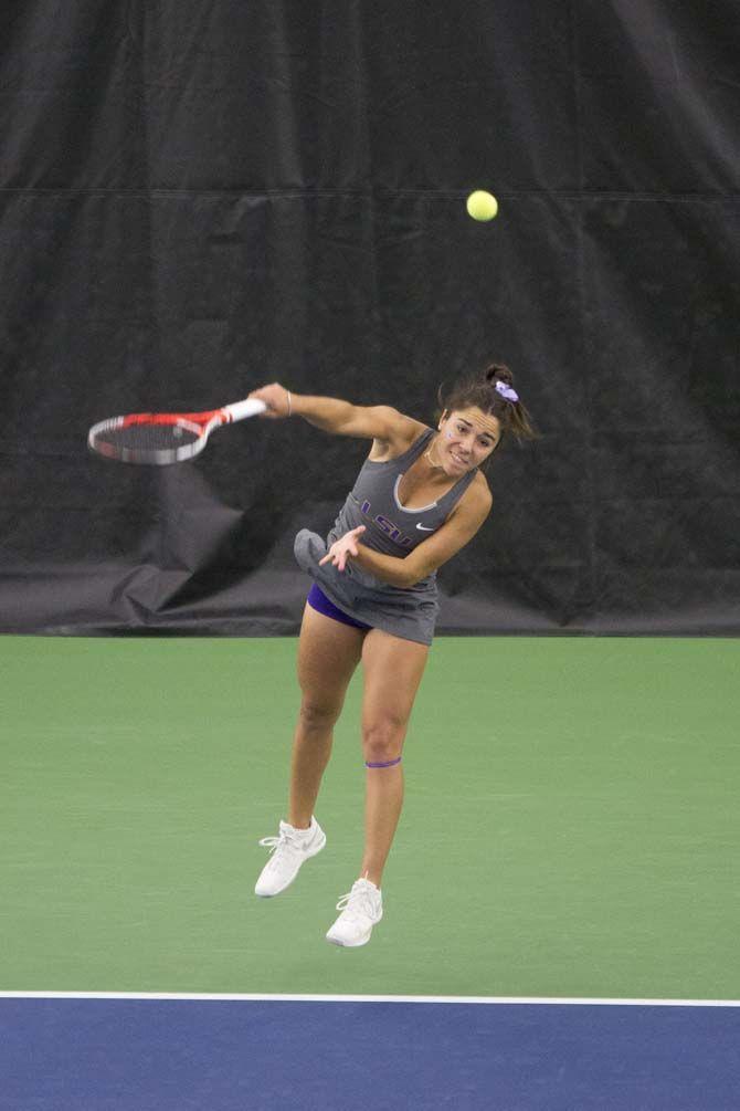 Junior, Joana Vale Costa, serves the ball against Ole Miss on Friday, March 11, 2016 at the LSU Tennis Complex.