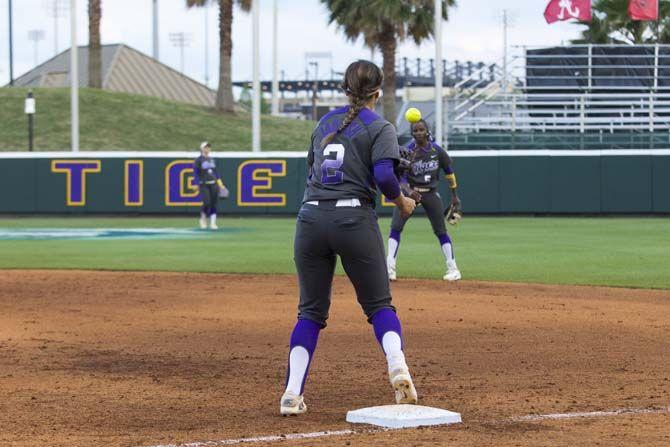 LSU junior infielder, Sahvanna Jaquish (02), catches the ball on first base for the out during the Tigers' 5-2 victory against McNeese State on Tuesday, April 26, 2016 at Tiger Park.