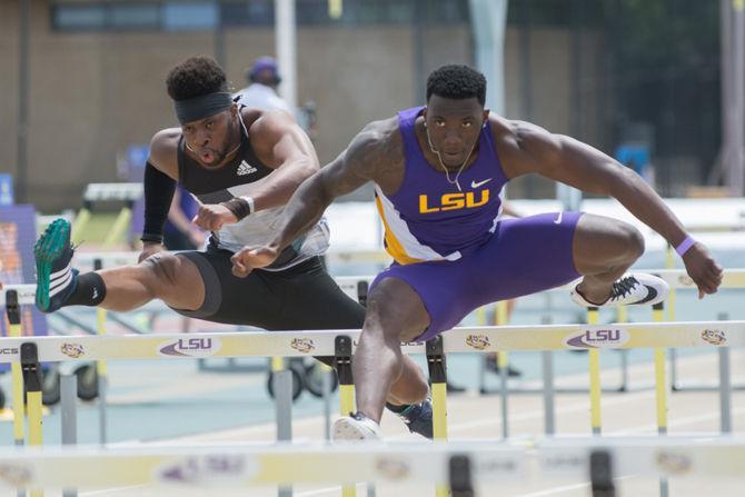 LSU junior Jordan Moore jumps hurdles during the Battle of the Bayou on Saturday, April 9, 2016 at Skip Bertman Stadium