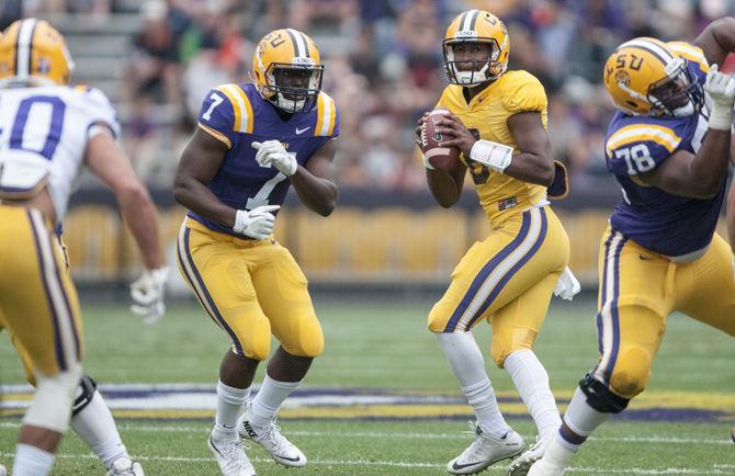 LSU junior quarterback Brandon Harris (6) prepares to pass the ball during the Tigers' Purple Team 17-7 victory against the Gold Team on Saturday, April 16, 2016 in Tiger Stadium.