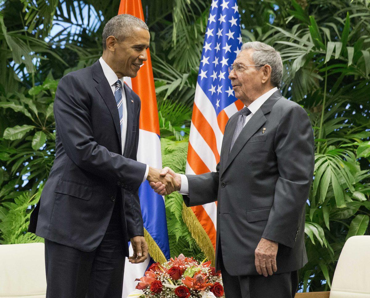 FILE - In this March 21, 2016 file photo, President Barack Obama shakes hands with Cuban President Raul Castro during their meeting at the Palace of the Revolution in Havana, Cuba. (AP Photo/Pablo Martinez Monsivais, File)