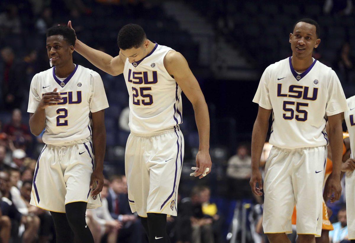 LSU players, from left, Antonio Blakeney, Ben Simmons, and Tim Quarterman, walk down the court late in the second half of an NCAA college basketball game against Tennessee in the Southeastern Conference tournament in Nashville, Tenn., Friday, March 11, 2016. LSU won 84-75. (AP Photo/John Bazemore)