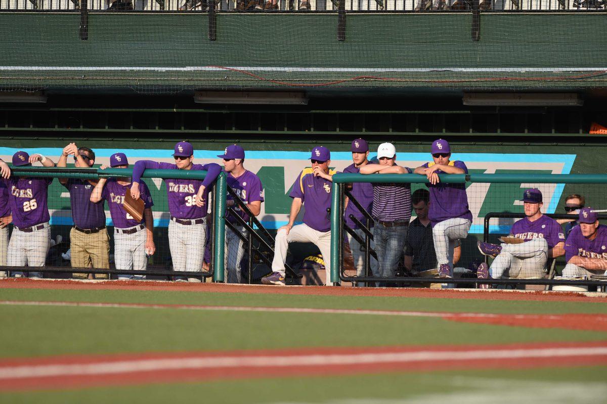 LSU coach Paul Mainieri and fellow Tigers watch during LSU's 4-1 loss to Tulane on April 26, 2016 at Turchin Stadium in New Orleans.&#160;