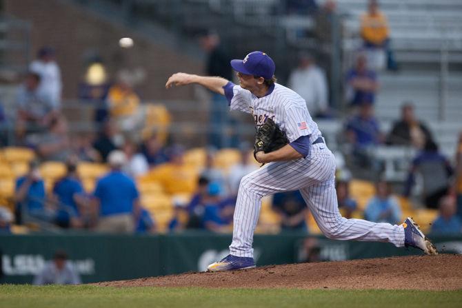 LSU sophmore pitcher Doug Norman (21) pitches during LSU's 7-0 defeat on Tuesday, April 12, 2016 at Alex Box Stadium