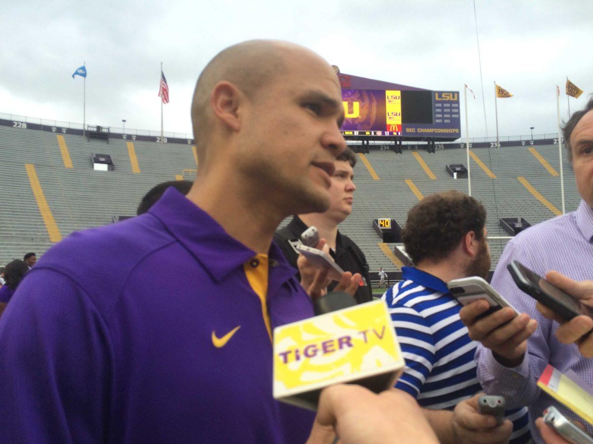 Dave Aranda meets with reporters