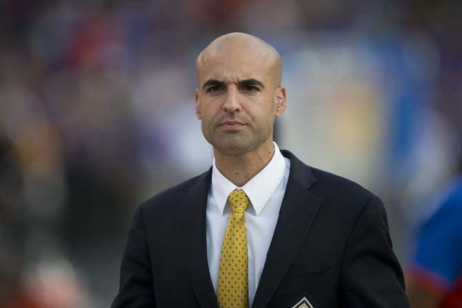 LSU associate director of Bands Dennis Llin&#225;s preparing for the Golden Band from Tigerland pregame show during the LSU 35-28 victory against the Gators on Saturday Oct. 17, 2015, in Tiger Stadium on LSU's campus.