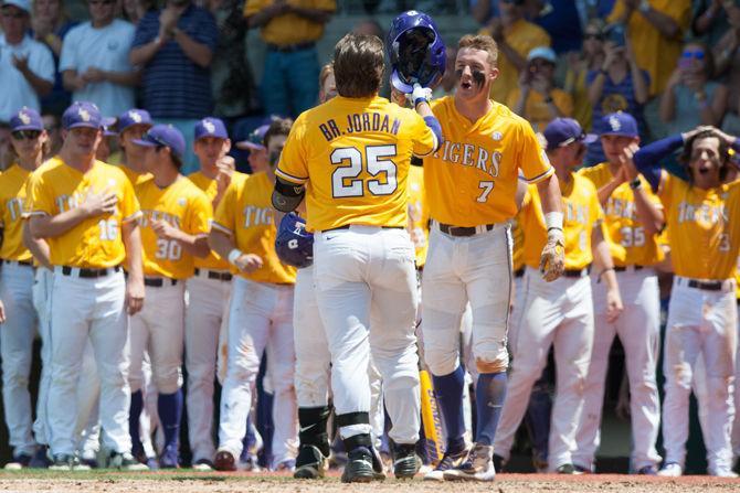 LSU sophmore infielder Bryce Jordan (25) celebrates his home run with his teammates during LSU's 11-8 victory on Sunday, April 24, 2016 at Alex Box Stadium