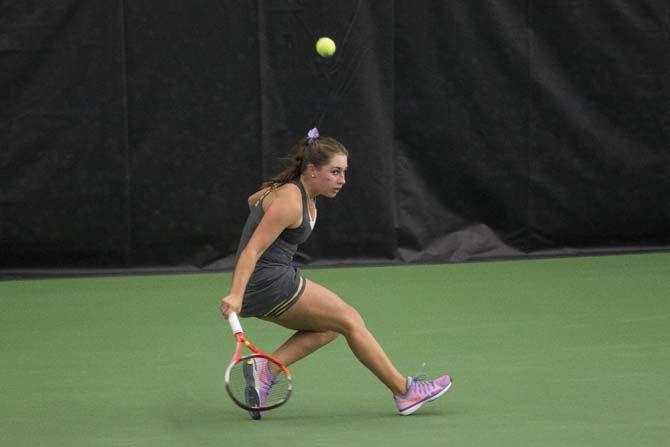 Senior, Ella Taylor, returns the ball against Ole Miss on Friday, March 11, 2016 at the LSU Tennis Complex.