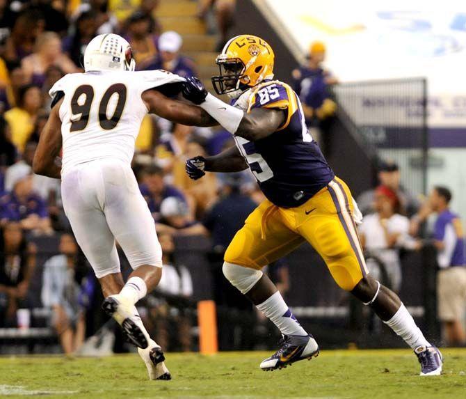 LSU junior tight end Dillon Gordon goes for the tackle of ULM player Saterday, September 13, 2014 during the Tigers' 31-0 victory against the Warhawks in Tiger Stadium.