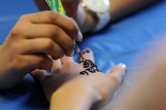 The first Islamic Awareness Day event hosted by the Muslim Student Association offered activities like turban wrapping, calligraphy, and henna on Thursday, March 19, 2015 at the International Culture Center.