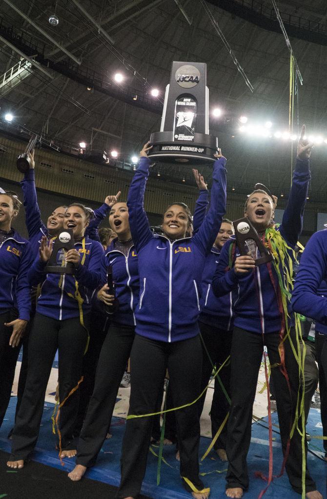 LSU gymnastics team celebrates after the Tigers' scored 197.4500 to earn the second place in the National Championship on Saturday, Apr. 16, 2016 in Dallas Fort Worth.