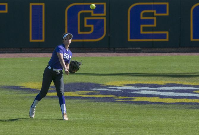 LSU junior outfielder Bailey Landry (26) throws the ball infield during the Tigers' 9-1 victory against Illinois State on Saturday, Feb. 27, 2016 in Tiger Park.