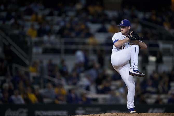 LSU junior pitcher Jared Poche&#8217; (16) winds up for the pitch during LSU's 12-1 win against Fordham in Alex Box Stadium on Friday March 4, 2016.