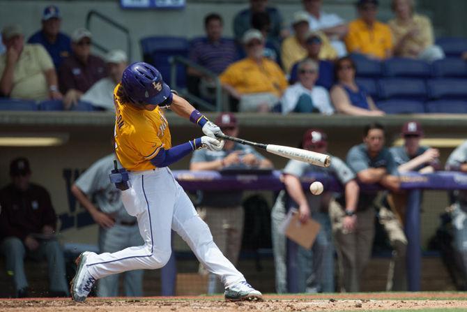 LSU junior infielder Kramer Robertson (3) bats during LSU's 11-8 victory on Sunday, April 24, 2016 at Alex Box Stadium