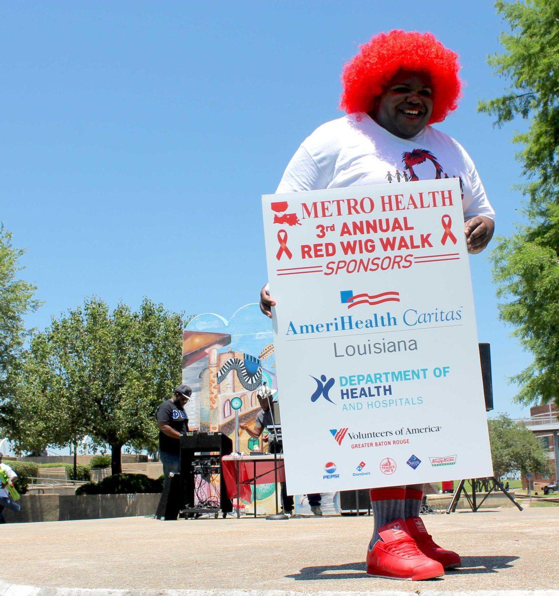 Event coordinator Bobby Graves participates in the third annual Red Wig Walk on Saturday, May 7, in order to bring more awareness to HIV/AIDS in Baton Rouge.