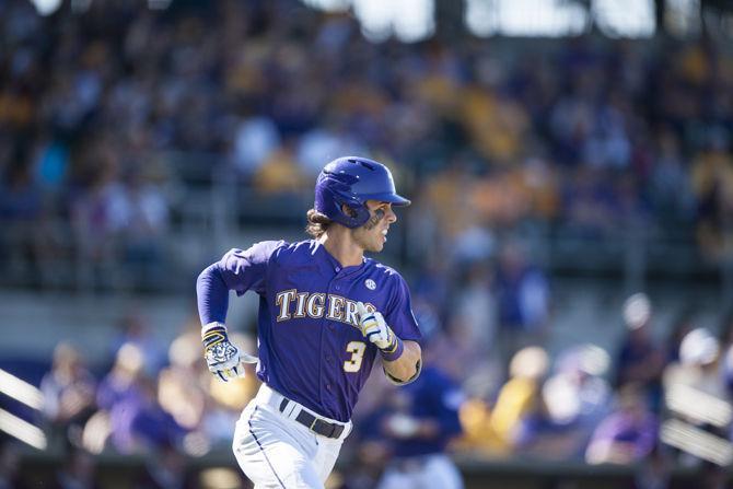 LSU junior infielder Kramer Robertson (3) runs towards first base on Saturday, March 5, 2016, during the Tigers' 15-1 win against Fordham at Alex Box Stadium.