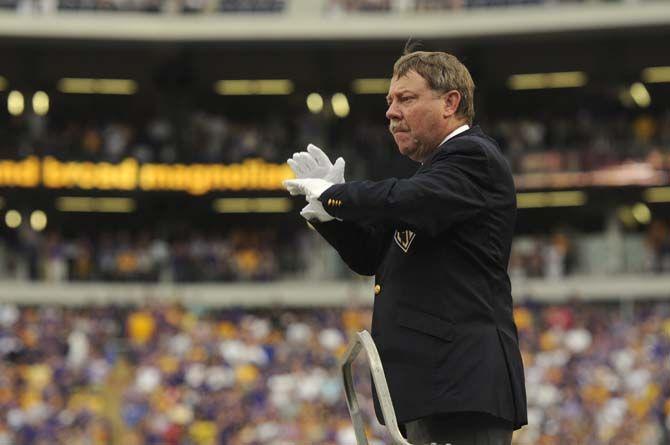 LSU's Director of Athletic Bands Roy King directs the National Anthem after the pregame show on Saturday Sept. 5, 2015, in Tiger Stadium.