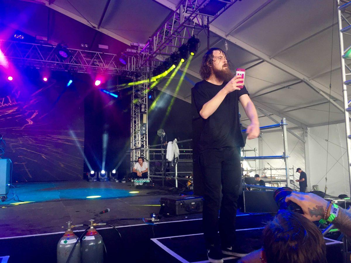 Kevin Saurer of Hippie Sabotage dances on stage during his performance Friday, May 20, at Hangout Fest in Gulf Shores, Alabama.