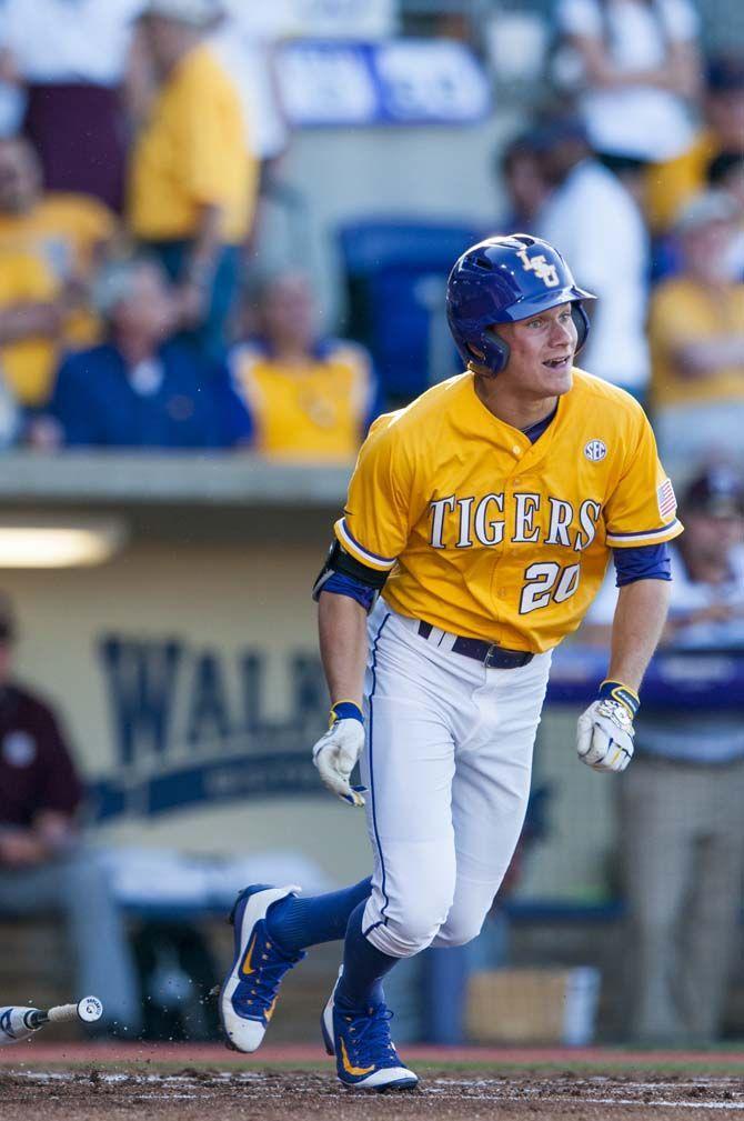 LSU freshman outfielder Antonie Duplantis (20) begins his run to first after a successful hit during the LSU vs Mississippi State baseball game on Saturday April 23, 2016.