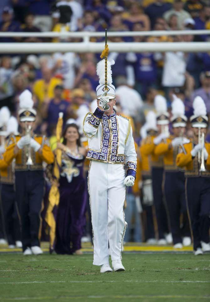 LSU Golden Band from Tigerland drum major Daniel Wendt leads the band onto the field for their pregame show during the LSU 35-28 victory against the Gators on Saturday Oct. 17, 2015, in Tiger Stadium on LSU's campus.