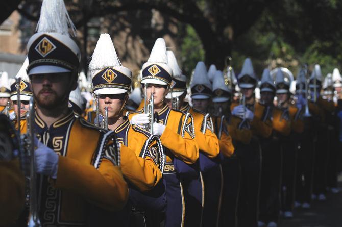 The Tiger Band marches in block on their way to Tiger Stadium on Saturday Sept. 5, 2015, on LSU's campus.