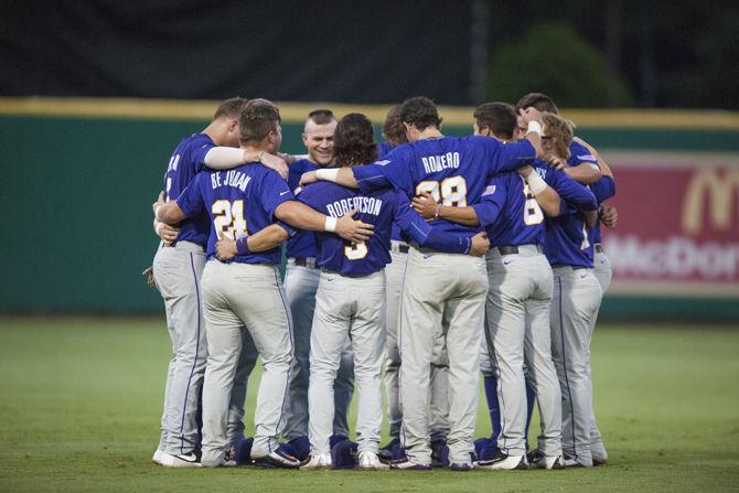 LSU players huddle before the Tigers' 4-3 loss against Coastal Carolina in the Super Regional on Sunday, June, 13, 2016 at Alex Box Stadium.