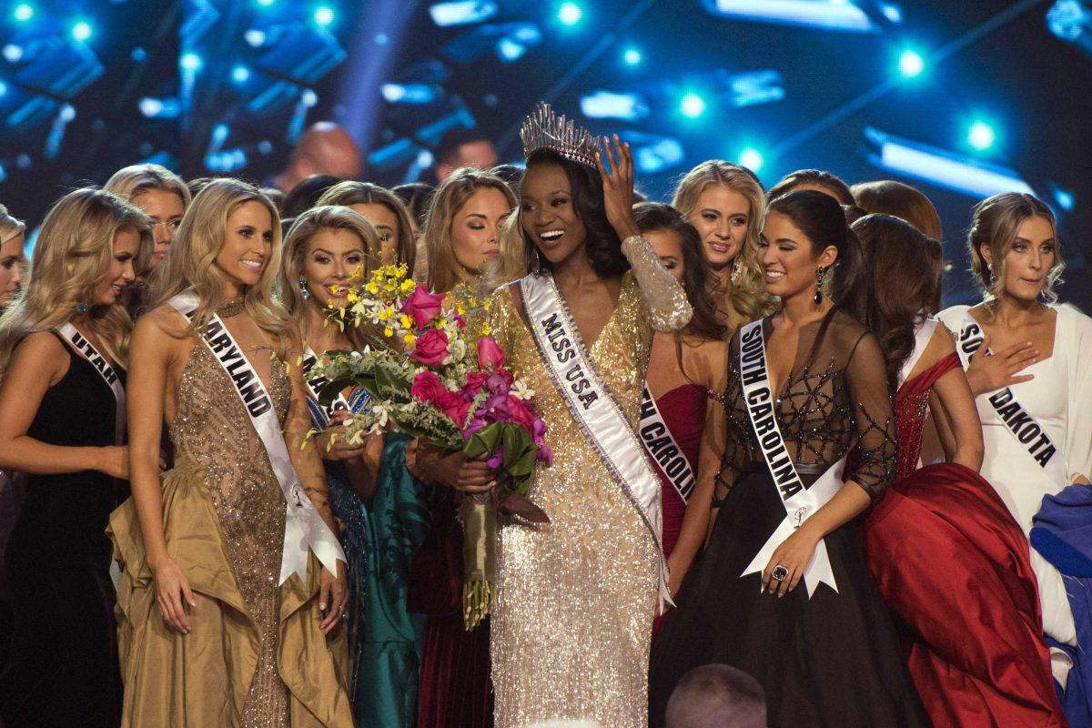 Miss District of Columbia Deshauna Barber smiles after being crowned Miss USA during the 2016 Miss USA pageant in Las Vegas, Sunday, June 5, 2016. (Jason Ogulnik/Las Vegas Review-Journal via AP) LOCAL TELEVISION OUT; LOCAL INTERNET OUT; LAS VEGAS SUN OUT