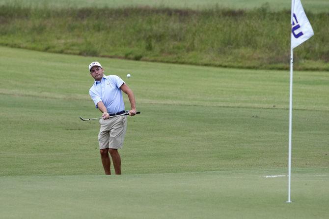 LSU senior golfer Zach Wright moves the ball to the green during the David Toms Intercollegiate tournament on Oct. 11, 2015, at the University Club golf course.