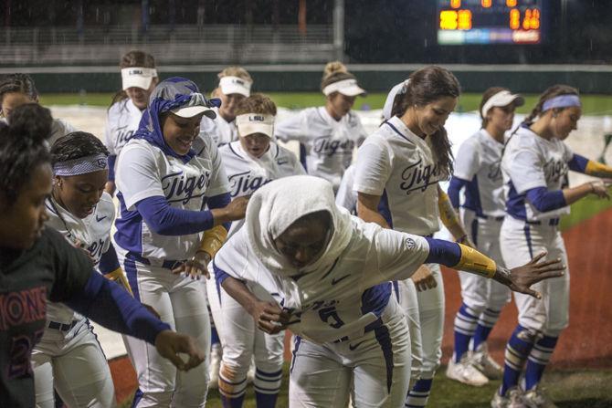 LSU softball players dance during the game against Northwestern State after it gets rain delayed on Wednesday, Apr. 20, 2016 in Tiger Park.