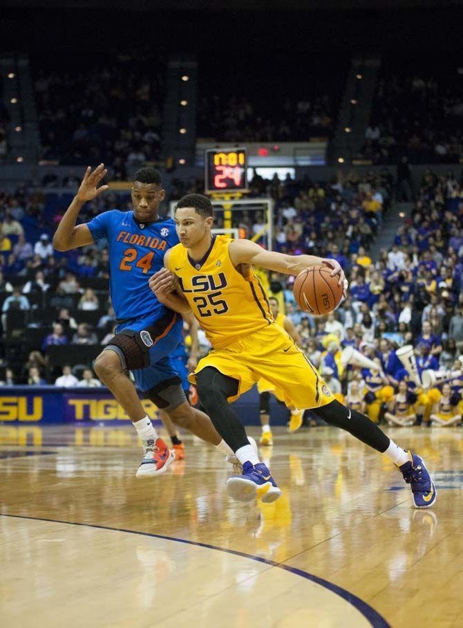 LSU freshman forward Ben Simmons (25) cuts around the Florida defense during the LSU 96-91 victory against the Florida Gators on Saturday Feb. 27, 2016, in the PMAC.