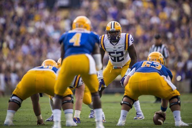 Prior to weather delays, LSU junior linebacker Kendell Beckwith (52) prepares for the play during the game Saturday, Sep. 5, 2015, against McNeese State in Tiger Stadium.