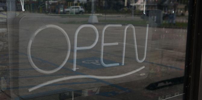 An open sign in Tigerland on Aug. 28, 2016 as businesses begin to bounce back from the recent curfew restrictions.