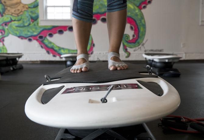 City Surf Fitness studio combines yoga with surfing techniques