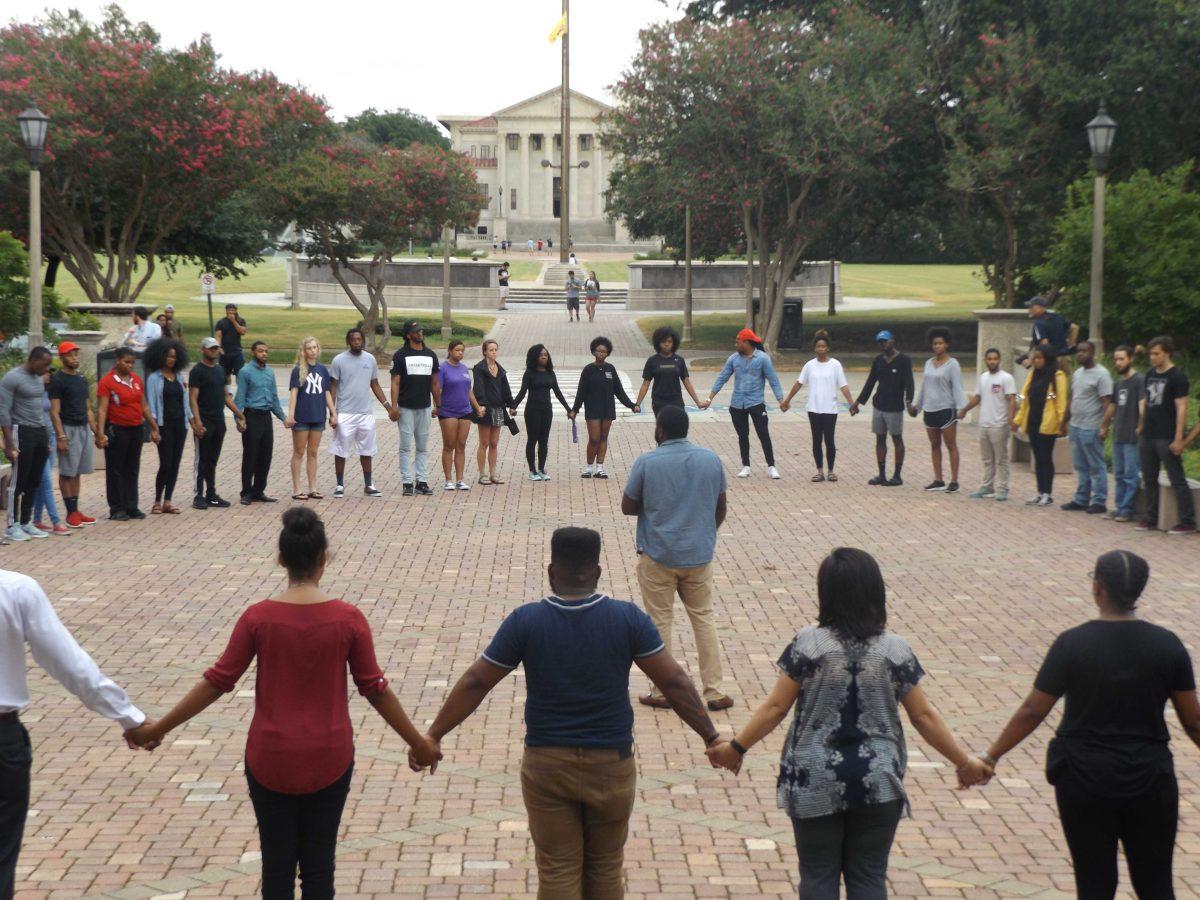 Students and community members gathered at the &#160;LSU Memorial Tower Monday, July 11, 2016, for a Unity Prayer following the weekend's Alton Sterling protests.