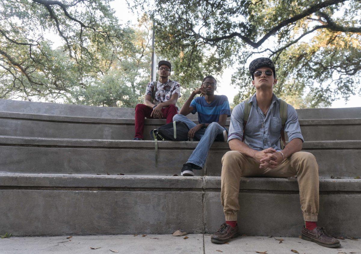 University sophomores Tyton Charles (left), Raheem Allen (middle) and Tony Blayze (right) combine their talents to form the Graduates, an up and coming local rap group.