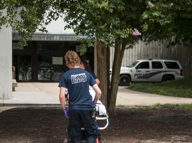 Residential assistants assist in setting up special needs shelter on campus