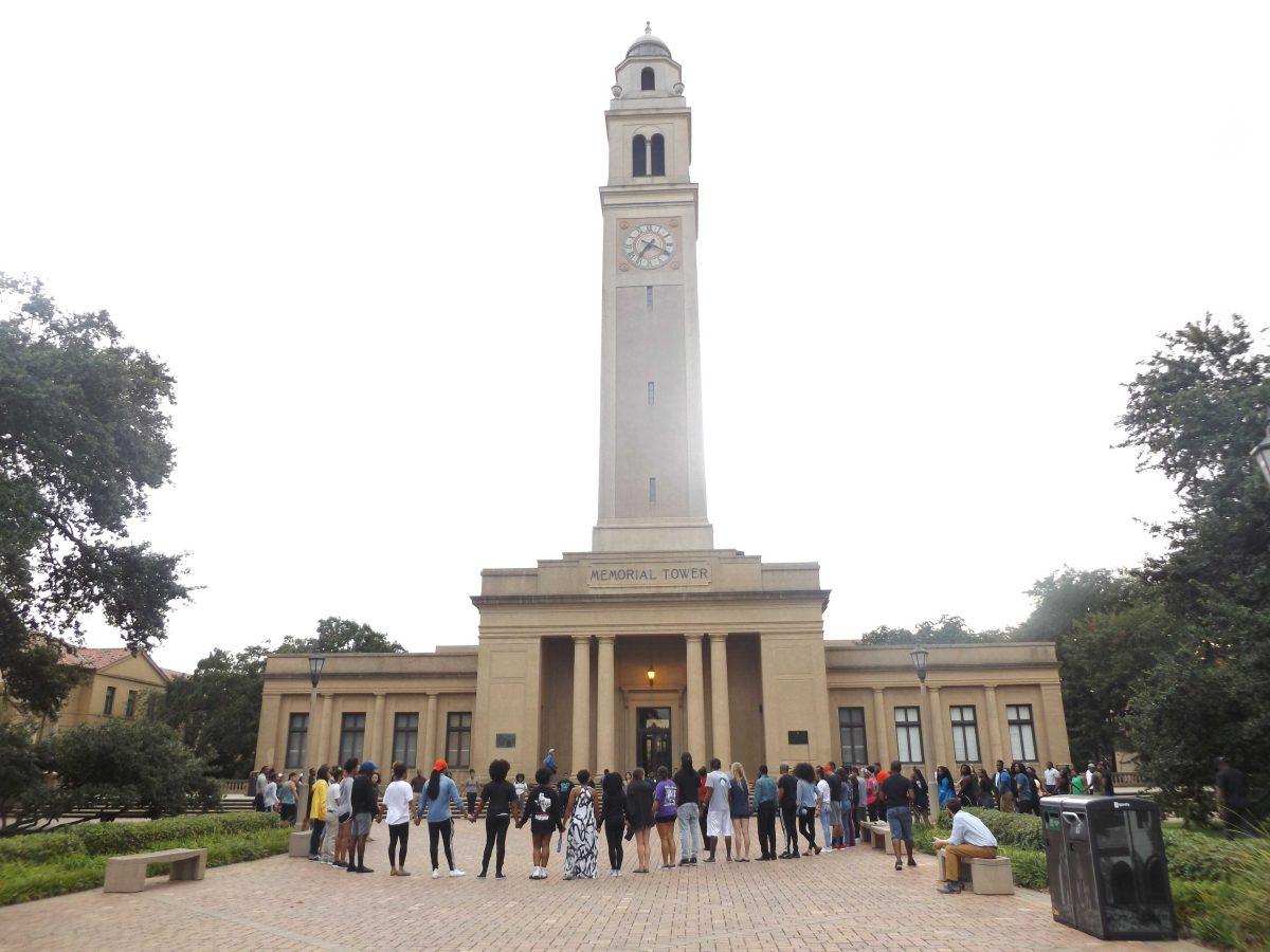 Students and community members gathered at the Memorial Tower Monday, July 11, for a Unity Prayer following the weekend's Alton Sterling protests.