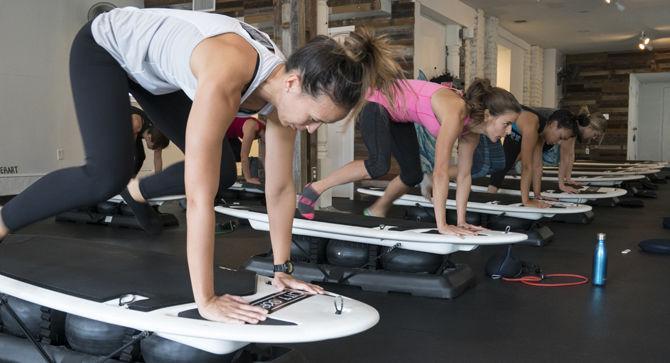 City Surf Fitness studio combines yoga with surfing techniques