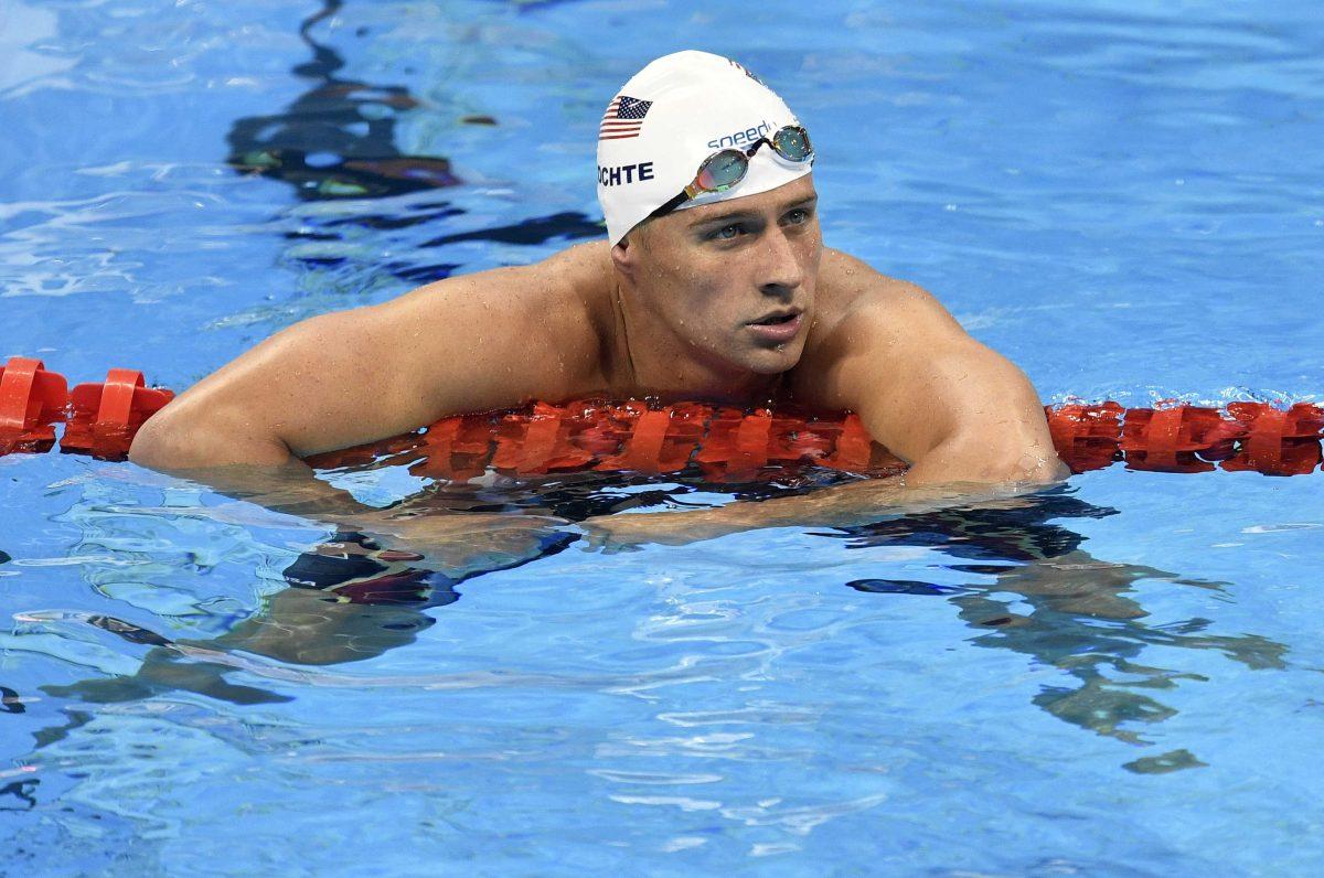 FILE - In this Aug. 9, 2016, file photo, United States' Ryan Lochte checks his time after a men' 4x200-meter freestyle relay heat during the swimming competitions at the 2016 Summer Olympics in Rio de Janeiro, Brazil. (AP Photo/Martin Meissner, File)