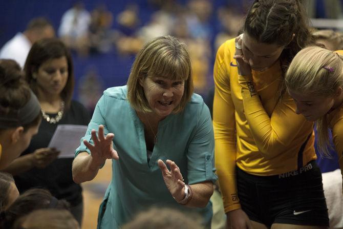 LSU volleyball head coach Fran Flory takes advantage of a time-out during the Tigers' 3-0 victory against Mississippi State University on Oct. 16, 2015, in the PMAC.