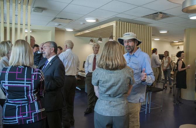 LSU Global partners and LSU faculty talk amongst themselves on Sept. 19, 2016 in the LSU Global Office.