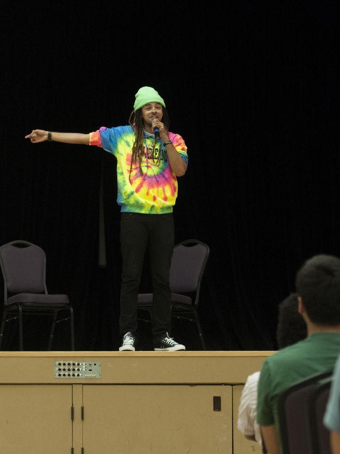 Rapper alumnus gives financial literacy talk in Royal Cotillion Ballroom