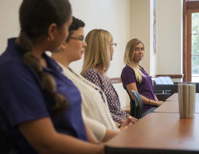 Petrayris Huertas, Kat Hightower, Kayla Kappel and Katherine Simmons participate in a panel of female veterans who speak to students about their experience in the military on Thursday, September 1, 2016 in the West LaVille library.