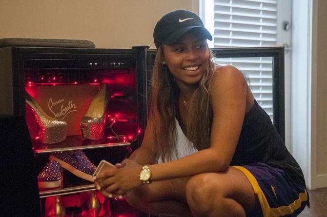 LSU basketball guard and human science and education major, Jenna Deemer (1), displays her extensive shoe collection and her passion for fashion on Sept. 5, 2016 in her home.