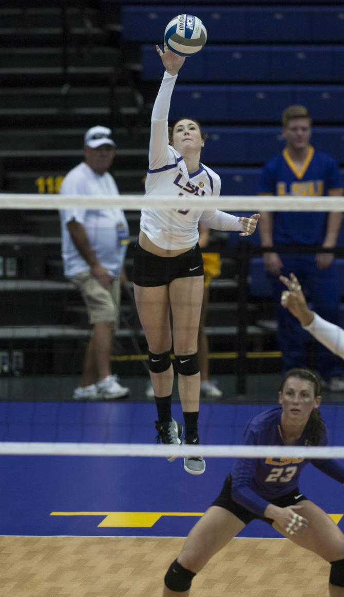 LSU sophomore setter Lindsay Flory (16) serves the ball during the Tigers' 0-3 loss against the University of Arkansas on September 25, 2016 in the Pete Maravich Assembly Center.