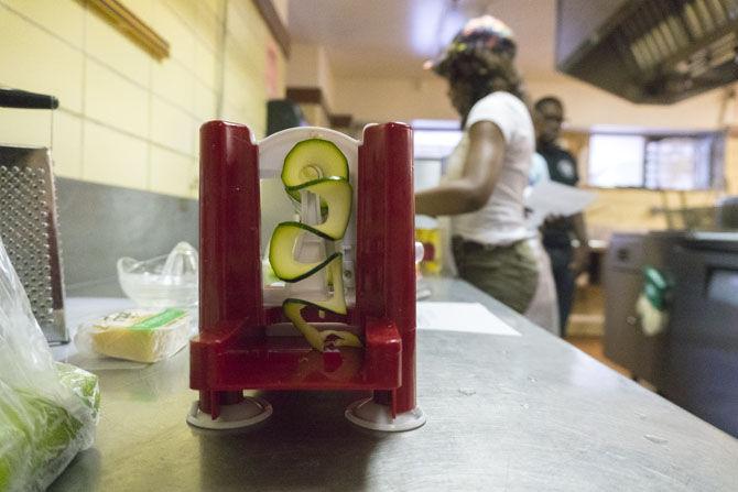 Love Our Community participants learn to make healthy plates using fresh ingredients during the program.