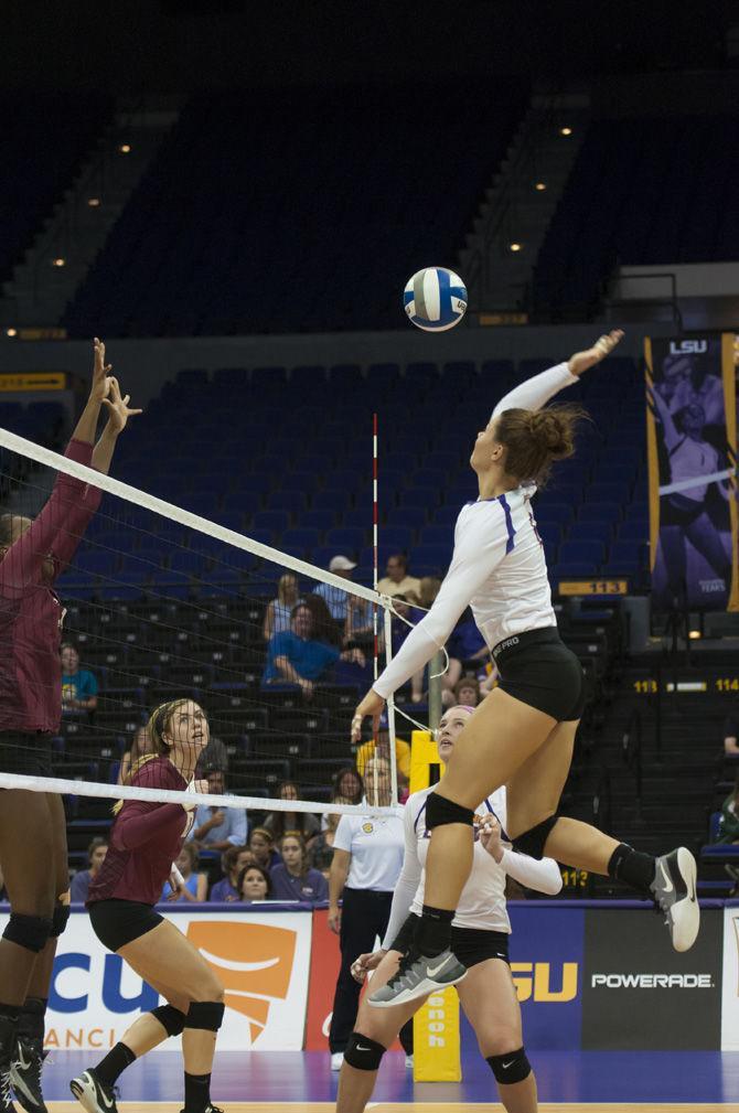 LSU senior middle blocker Tiara Gibson spikes the ball on Sunday, Sept. 18, 2016, during the Tigers 3-0 loss to Florida State at the Pete Maravich Assembly Center.