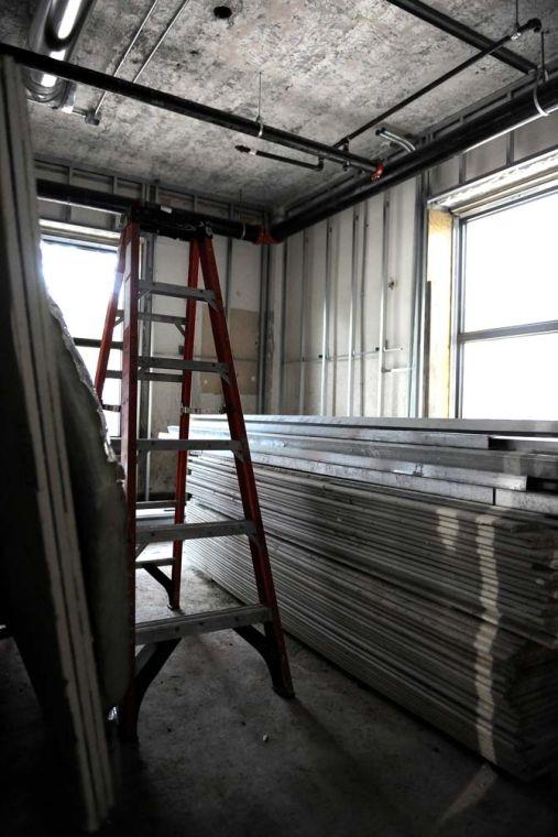 A ladder and other construction material sit in an unfinished basement dorm room April 18, 2013 in Annie Boyd Hall.