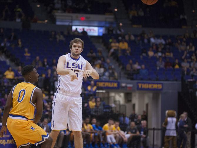 LSU junior forward Brandon Eddlestone (45) passes the ball during LSU's 81-70 victory over McNeese State University on Friday, Nov. 13, 2015 in the Pete Maravich Assembly Center.